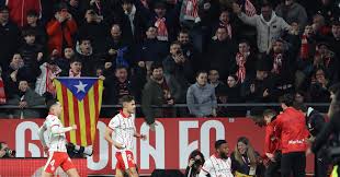 Barcelona stunned by Girona 2-1 to leave Real Madrid top of LaLiga