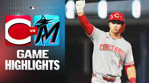 Lowe, McClain rally in extras to power Reds' victory