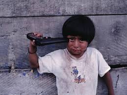 Image result for picture of small boy holding gun