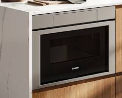 Image of modern Bosch microwave oven in kitchen settings