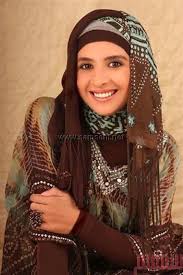 أزياء الفنانات المحجبات Images?q=tbn:ANd9GcS-Q-7xD-1L6SJHUo2CSHn_R1Qkcja9w6glomVPlT8mysWehlJT