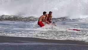 Video: Heroic lifeguards rescue boy from pounding Santa Cruz waves