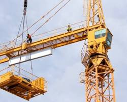 Image of Intermediate Rigger (RI) operating a crane on a construction site