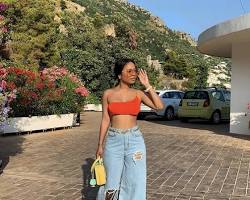 Imagem de Look com calça legging e pantalona