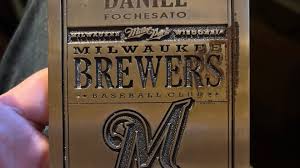 Milwaukee Brewers fan Nate Holzman prepares to attend Game 1 of the World Series with his Timeless Ticket
