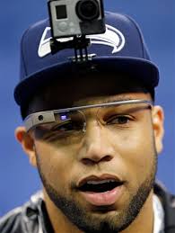 ... Tate wears Google glasses during media day for the NFL Super Bowl XLVIII football game Tuesday, Jan. 28, 2014, in Newark, N.J. (AP Photo/Matt Slocum) - 24567779_BG2