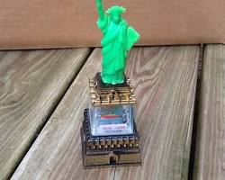 vintage 1950s New York snow globe glass Statue of Liberty metal base, AI generated