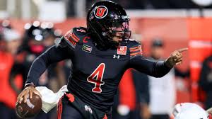 Utah football schedule 2026 home game at Rice-Eccles Stadium with Utes players entering the field