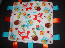 Résultat de recherche d'images pour "taggy blanket"