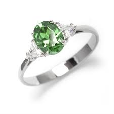 Stunning Ring, 2 Cts. T.W, with 1 Ct Oval Cut Emerald Center and White Trilliant Diamond