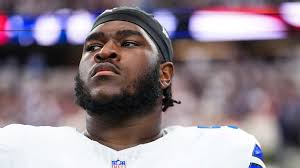 Cowboys' Tyler Booker to Miss Significant Time with Ankle Injury