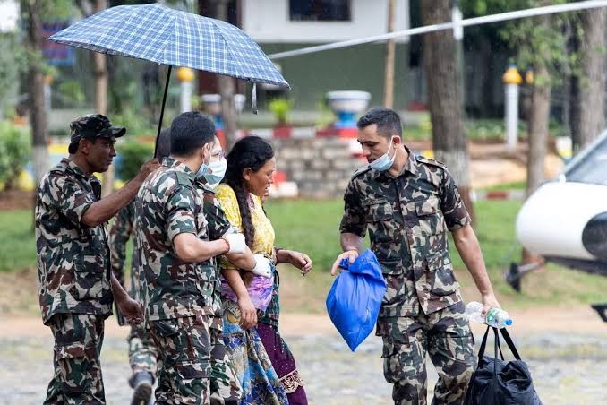 Missing soar over 2,400 after deadly Nepal, China floods; rescuers recover 584 bodies as new flood threat looms