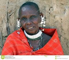 Editorial. Editorial image. Not to be used in commercial designs and/or advertisements. Click here for terms and conditions. - mature-masai-woman-traditional-dress-jewellery-village-near-ngorogoro-crater-tanzania-th-september-head-shoulders-shot-39655832