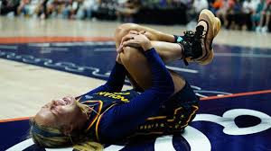 Sophie Cunningham suffers a knee injury during a game