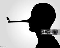 รูปภาพPerson lying with a Pinocchio nose