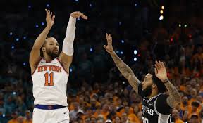 Jalen Brunson injury: Knicks star suffers apparent right knee injury in NBA Finals Game 1