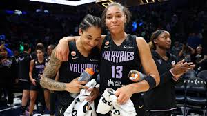 WNBA players competing during a regular season game
