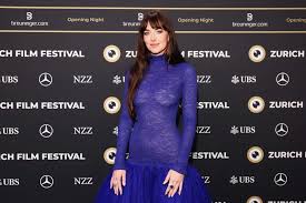 Dakota Johnson ‘Slowly Dating’ After Chris Martin Split: ‘More at Peace’