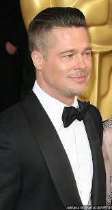 Brad Pitt Says He &#39;Cleaned Dog Poop&#39; Before the Oscars. See larger image. Brad Pitt collected Best Picture trophy for &quot;12 Years a Slave&quot; at the Oscars which ... - brad-pitt-says-he-cleaned-dog-poop-before-the-oscars