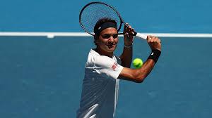 Federer returns to Rod Laver Arena, practises with Ruud