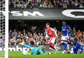 Teenager Dowman scores twice as Arsenal progress in League Cup