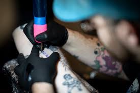 Tattoo artist JC Stroebel, known for inking ‘Naz Reid’ on fans, recovering after battle with brain cancer