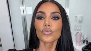 Kim Kardashian Is Almost Unrecognizable in Scary Blue Hair & Black Teeth Halloween Photos