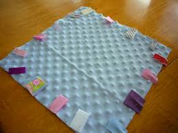 Résultat de recherche d'images pour "taggy blanket"