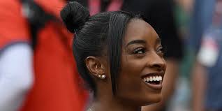 Simone Biles Claps Back at Criticism Over Taylor Swift, Travis Kelce Wedding Invite