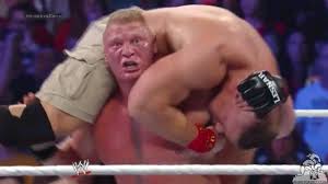 Image result for brock smiles at undertaker