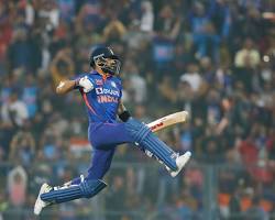 Virat Kohli celebrating a century