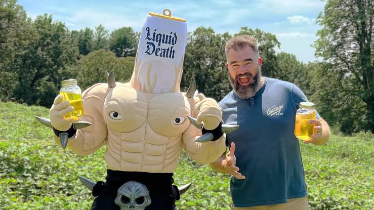 Liquid Death and Garage Beer tackle AI data center cooling with humor, featuring Jason Kelce in a pee-themed campaign