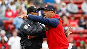 Cora ejected during animated argument in Game 1 of twin bill