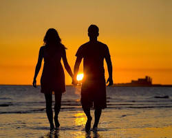 Image of Two lovers holding hands