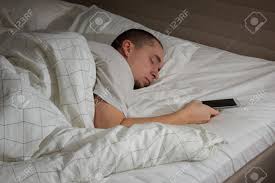 Image result for picture of a man sleeping on a bed