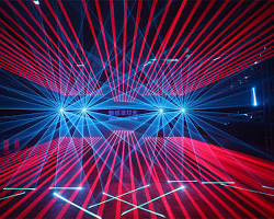 Image of Laser stage lights creating a dynamic light show