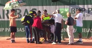 French Open star suffers horror fall and bursts into tears as paramedics rush to court