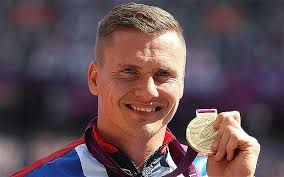 Winning feeling: Britain&#39;s David Weir with his gold medal after winning the men&#39;s 5,000m T54 at the Olympic Stadium Photo: PA - david-weir_2328057b