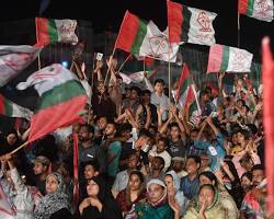 PMLN flag and an MQM flag waving side by side