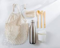 Image of reusable water bottle, coffee mug, and shopping bag