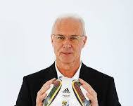 Image of Franz Beckenbauer receiving the FIFA World Cup trophy