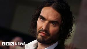 Comedian Russell Brand Charged with Rape and Sexual Assault