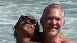 GMA's Robin Roberts, 65, shows off six-pack in tiny striped bikini on Rio de Janeiro beach trip with BFF Sam Champion