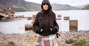 Claudia Winkleman's bomber proves bitter chocolate is autumn's go-to shade - and you can shop a match for £80 - Good Housekeeping