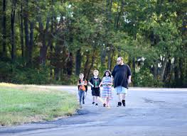 Father figures: Dads join students during annual Fathers Walk Your Child to 
School Day