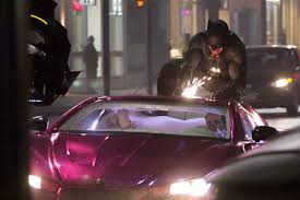 Image result for batman on top of joker's car