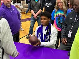 Ole Miss QB Trinidad Chambliss shares football journey with local students in return to Michigan