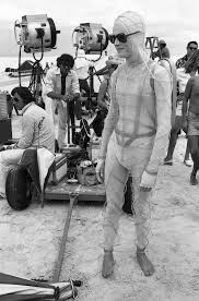 David Bowie & Candy Clark on the set of The Man Who Fell To Earth, 1975, by David James.