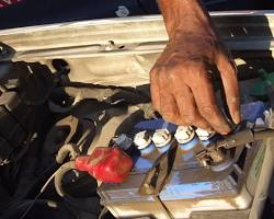 Hình ảnh về Car battery replacement on the road