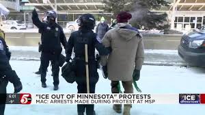 Thousands rally against immigration enforcement in subzero Minnesota temperatures, arrests at airport protest